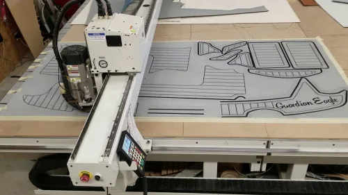 CNC machine cutting an EVA foam deck - NauticDeck